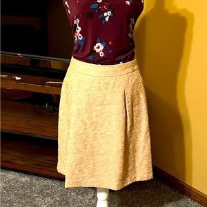 Gold, beautiful pattern mini skirt